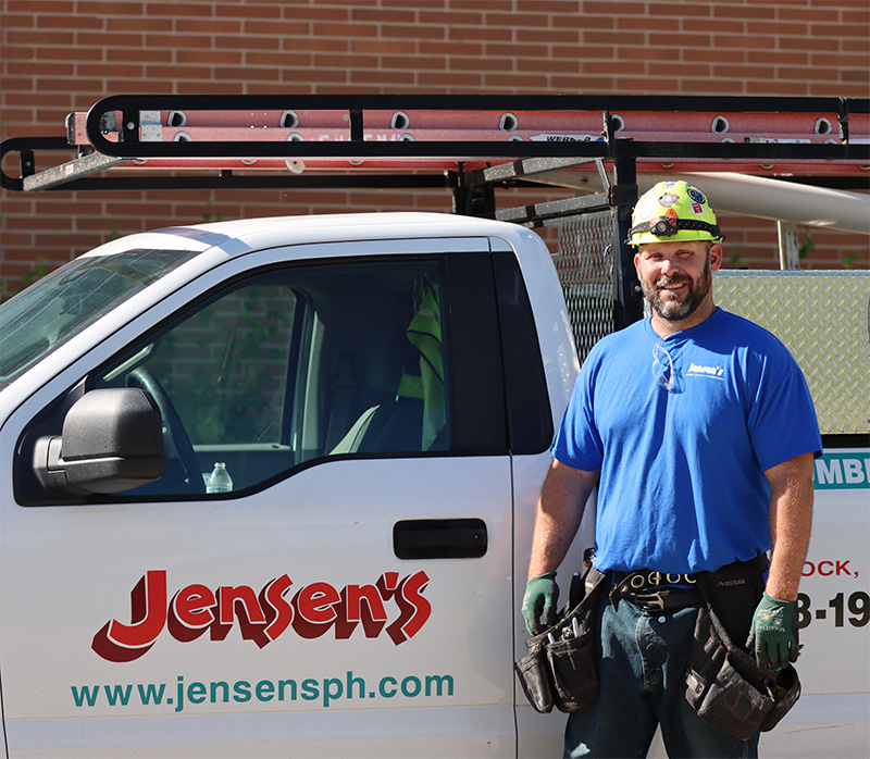 GHC Technicians Working on Outside HVAC Unit